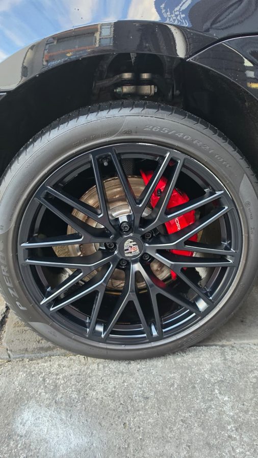 Refinished alloy wheel with red brake caliper